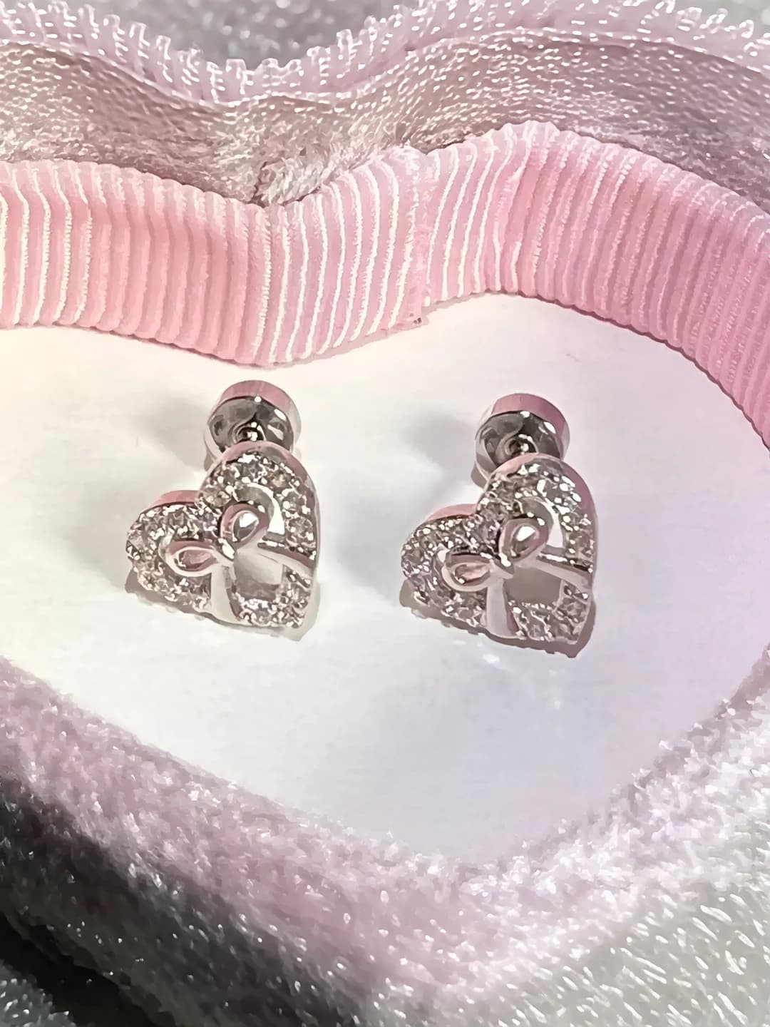 Women's 316L titanium steel stud earrings with white zircon, bow and heart design