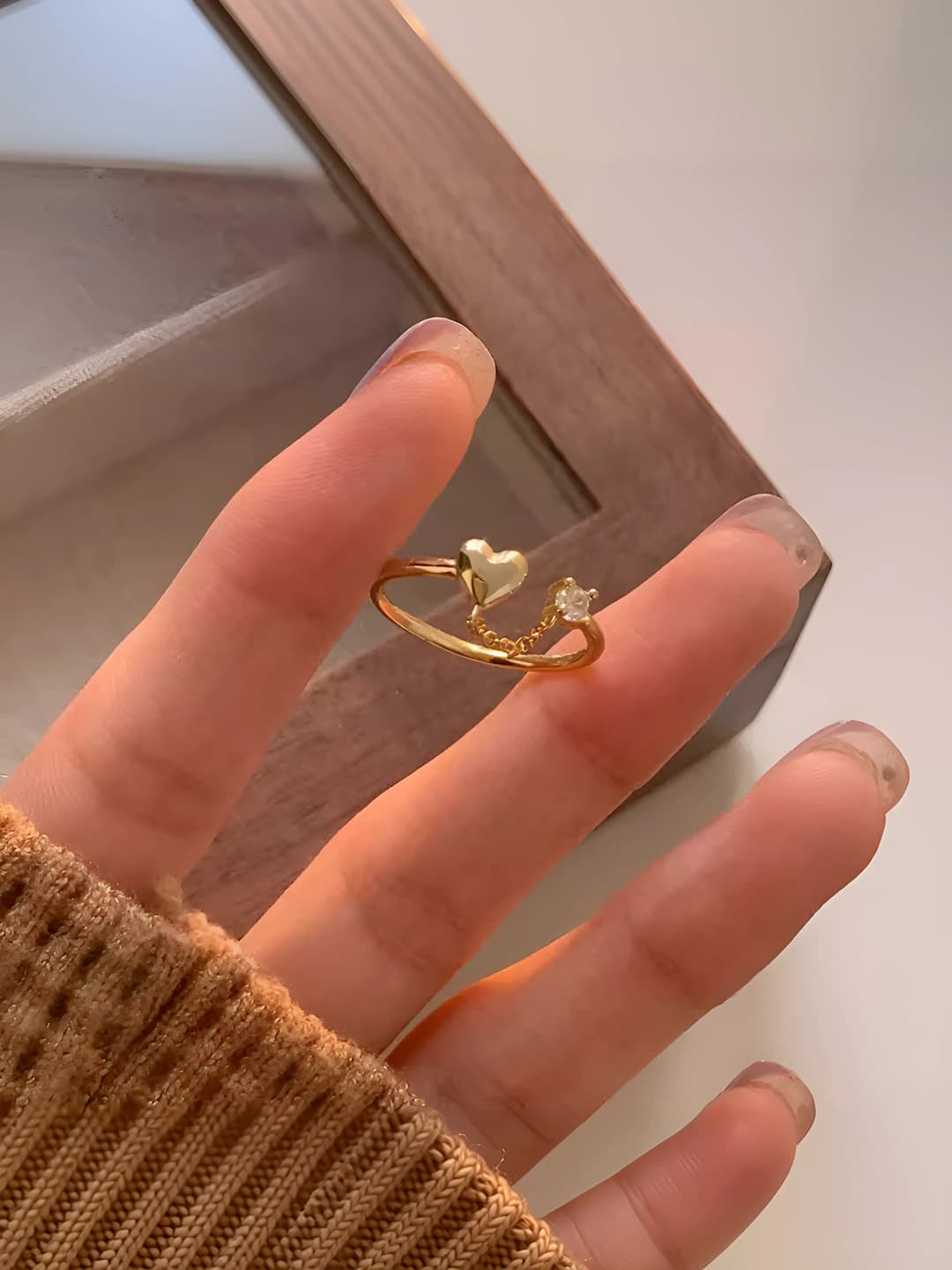Gold heart tassel ring