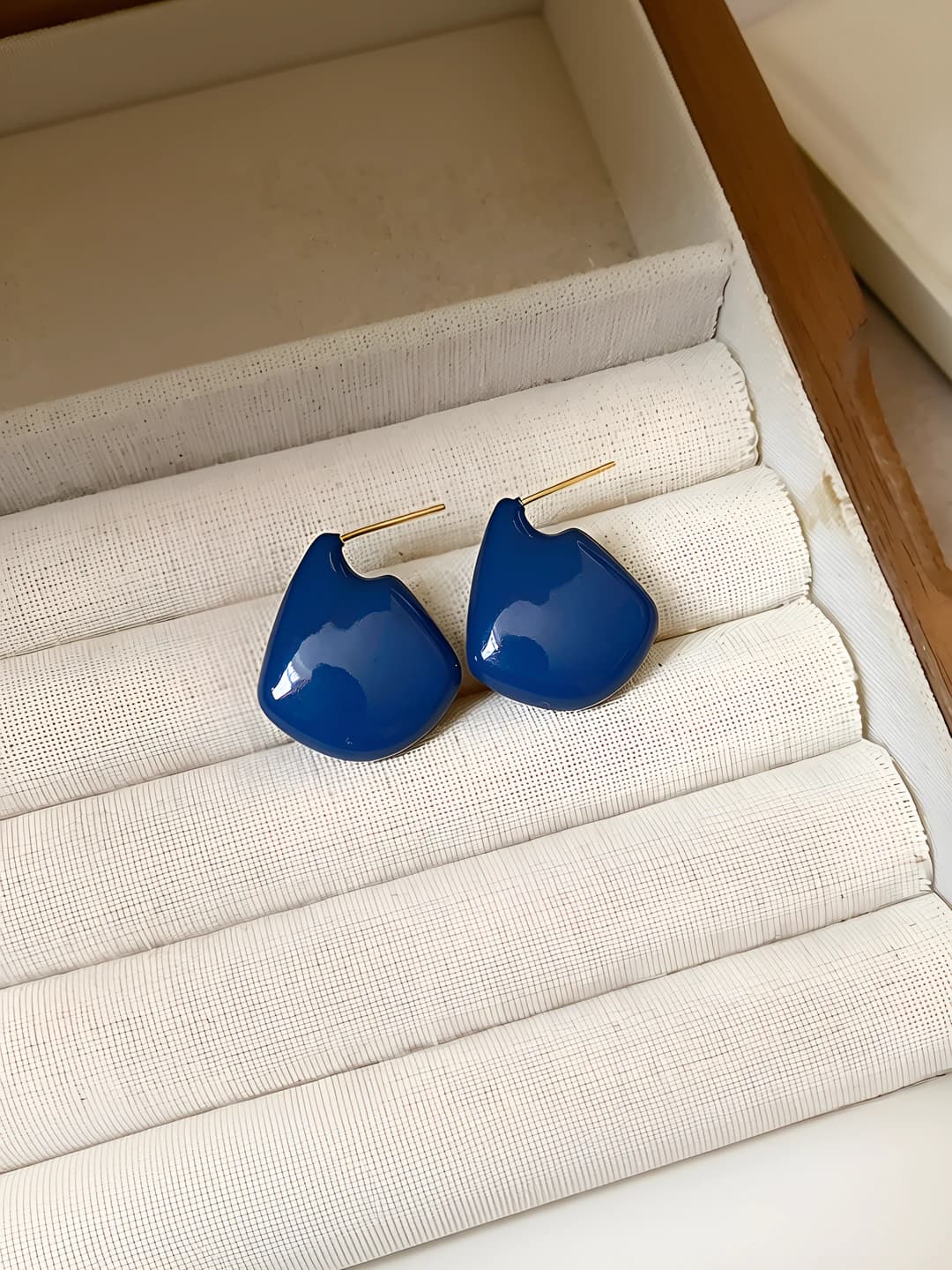 Blue, gold-plated