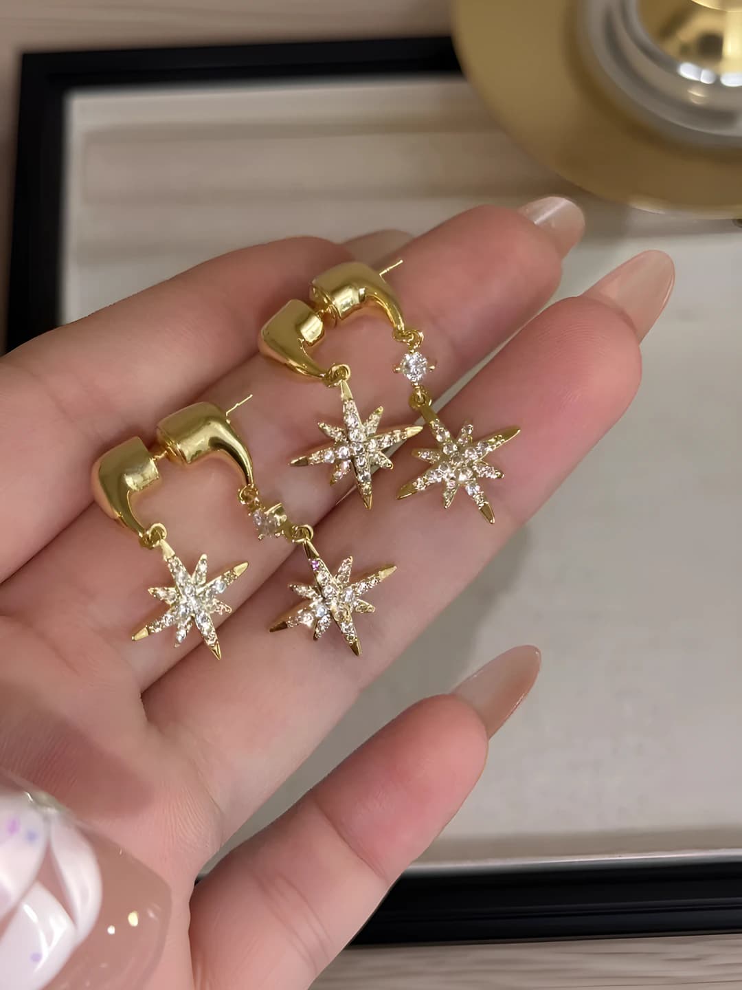 Gold 8-point star stud earrings 928