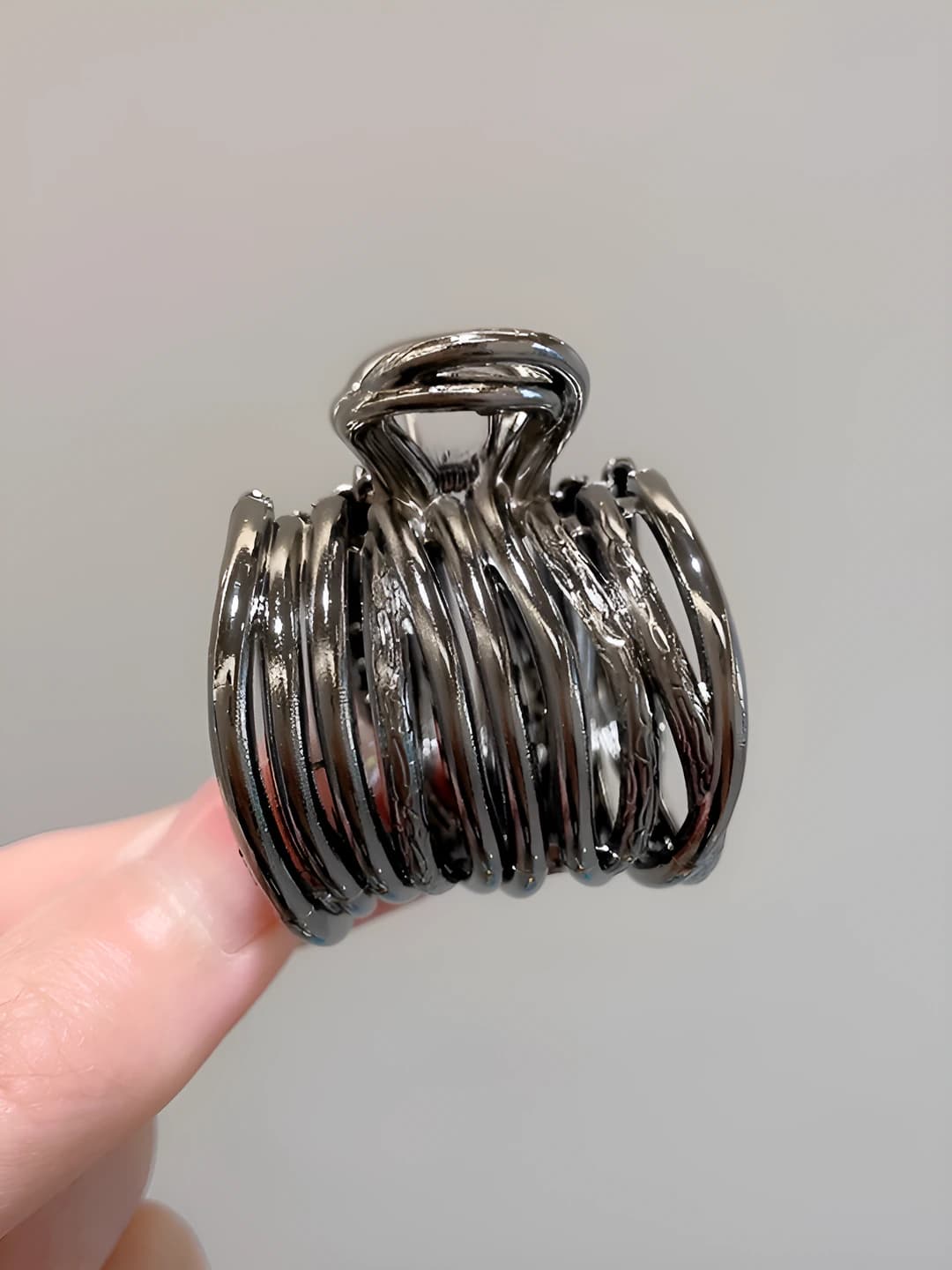Black, ~3.5 cm
