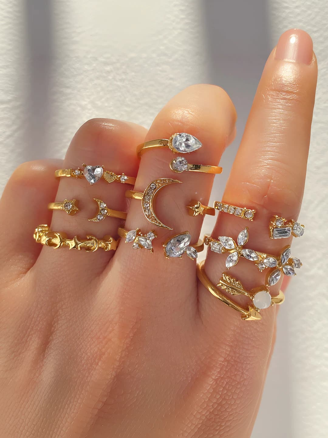 Women's 9-piece ring set, layered style with star and moon design, gold plated, adjustable size, teardrop rhinestones
