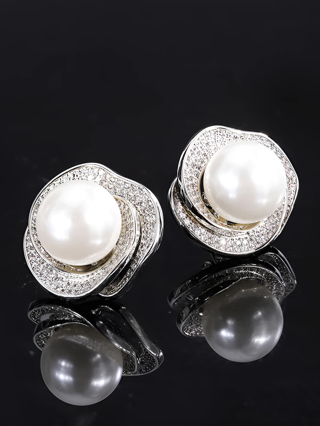 White pearl stud earrings