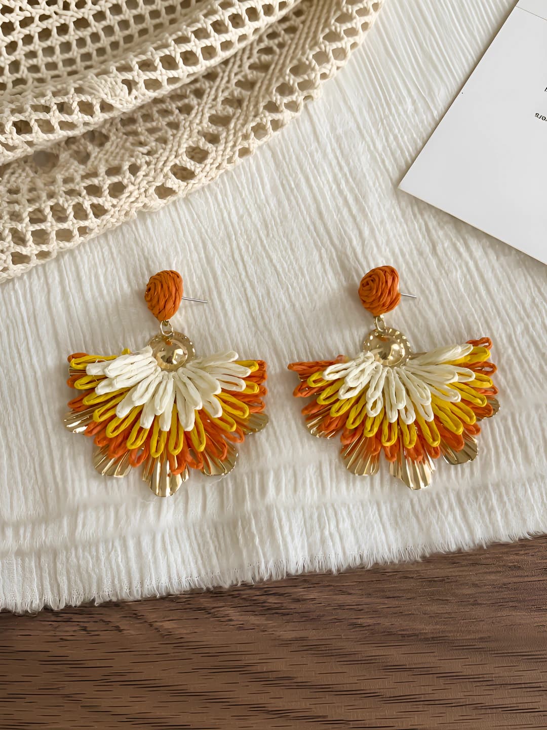 Orange fan-shaped studs