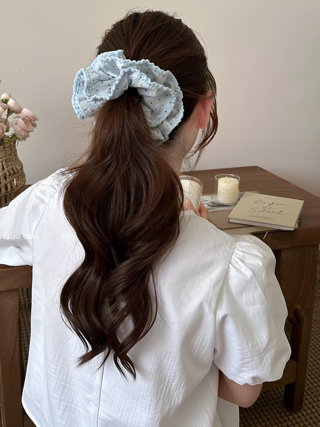 Women's blue polka dot stretch hair scrunchie with ruffled edge