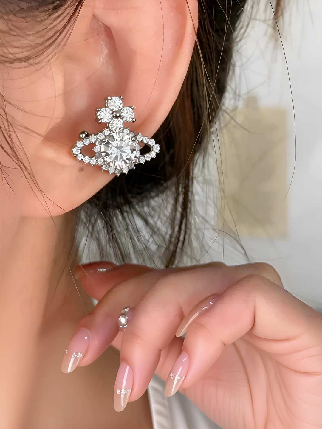 Women's Saturn design element earrings with micro-set zircon, geometric shape, sweet and cool style