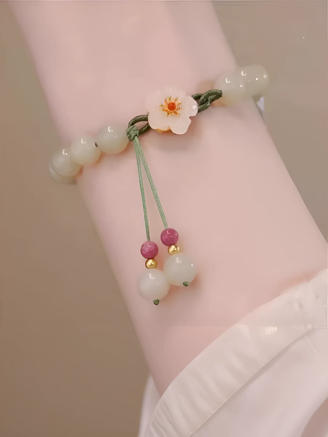 Women's beaded woven bracelet with stone and floral pattern