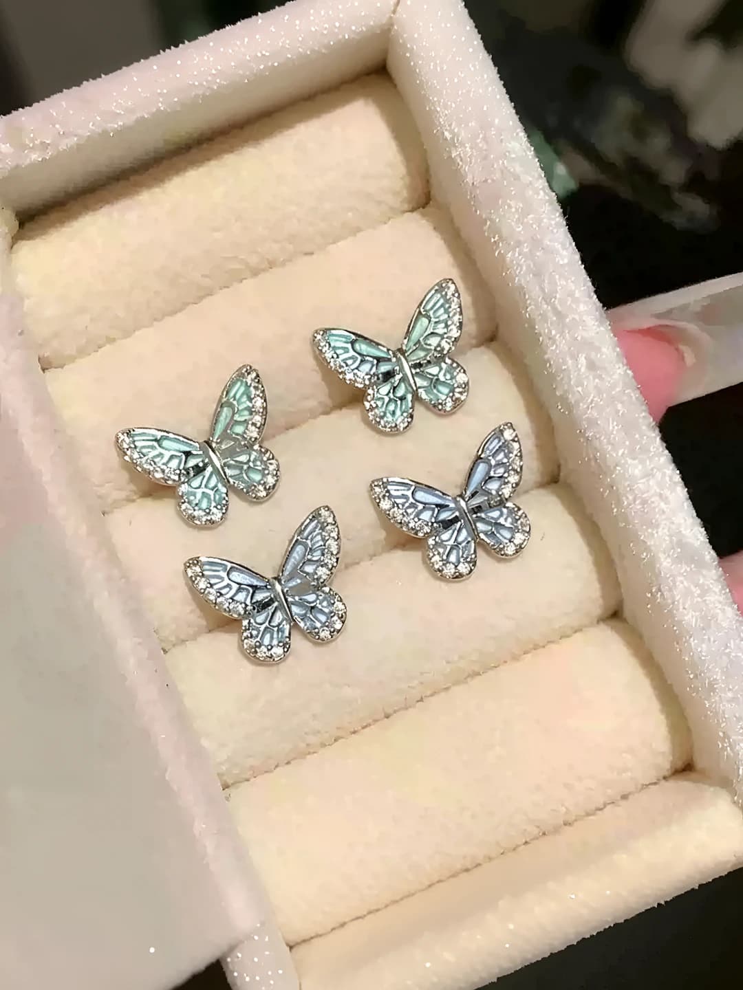 Women's 316L titanium steel butterfly stud earrings with blue-green two-tone enamel finish