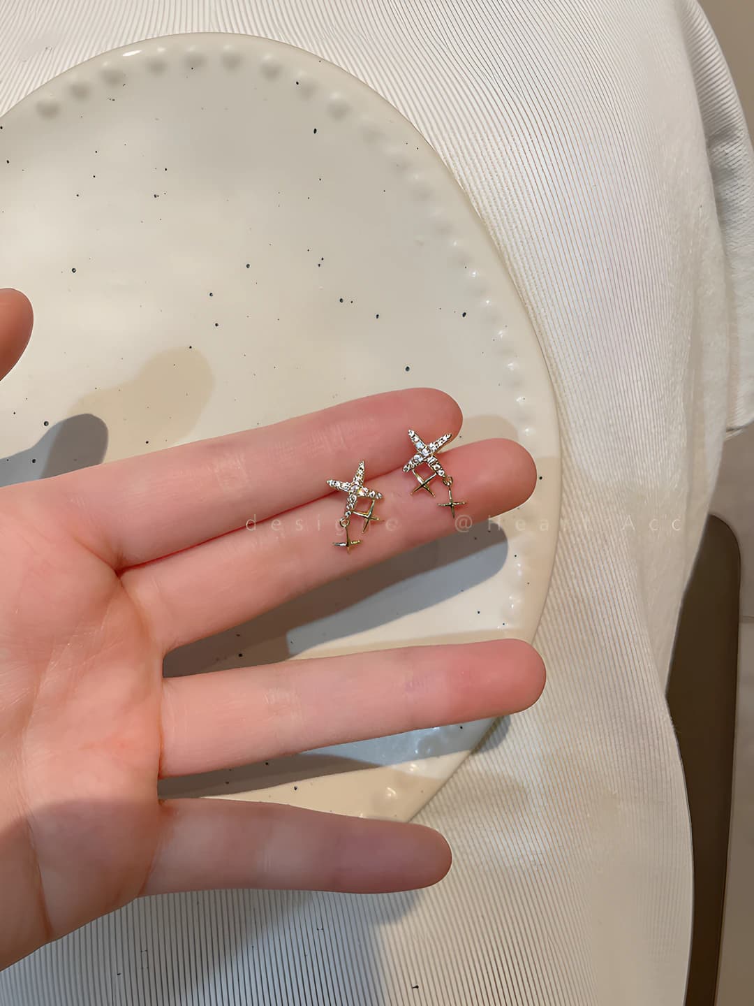 Gold large and small star earrings