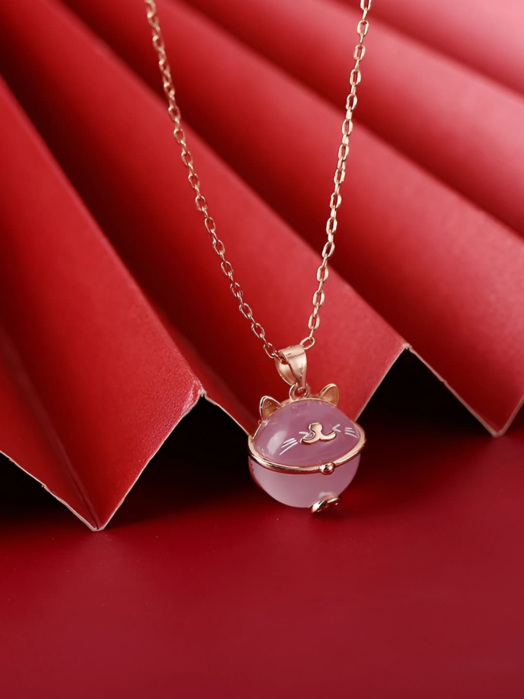 Women's necklace with cat pendant and pink crystal