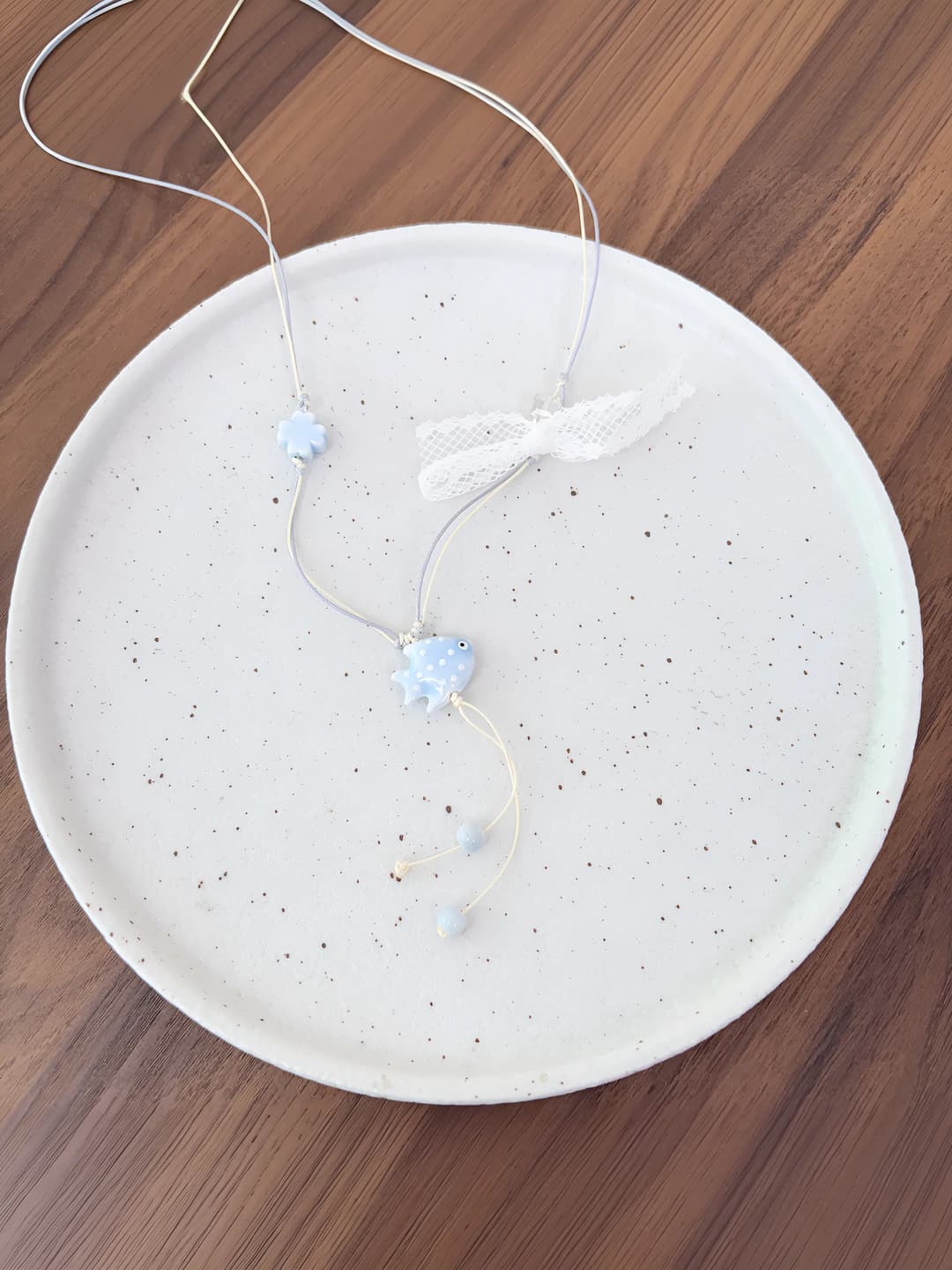 Light blue small fish necklace