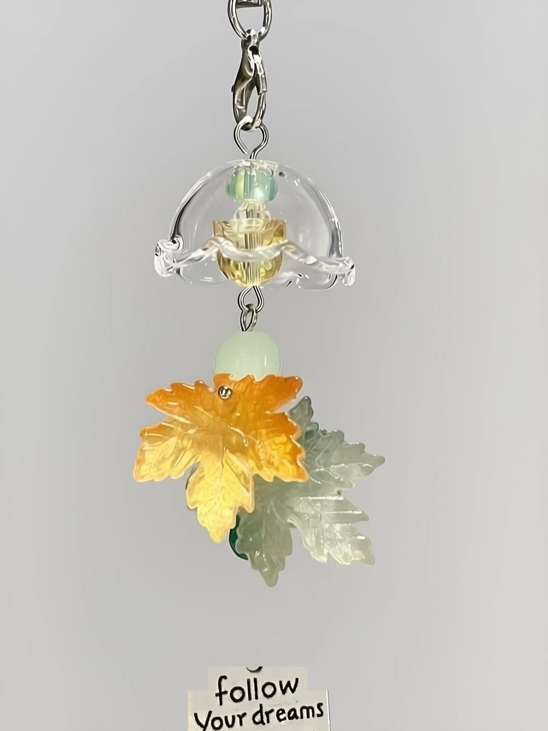 Y8 green maple wind chime charm