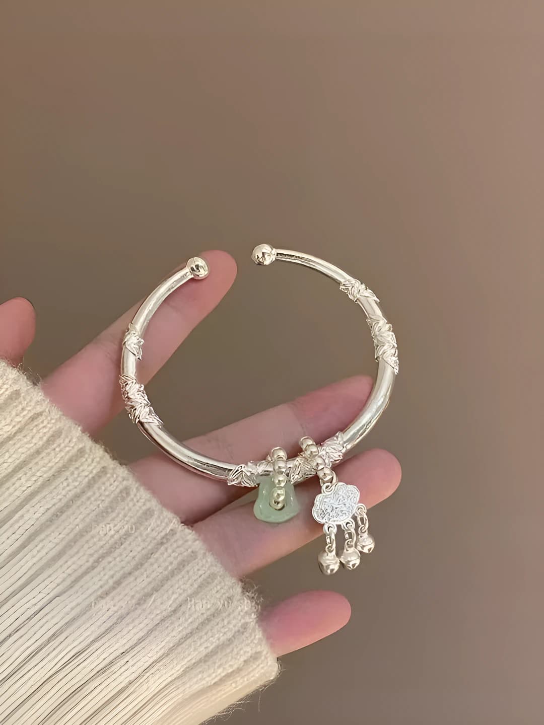 Women's Chinese style bangle bracelet with jade and floral design, safety lock charm