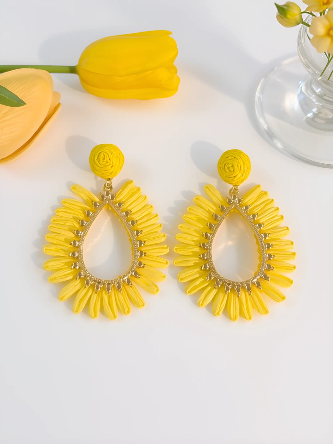 Yellow openwork woven stud earrings