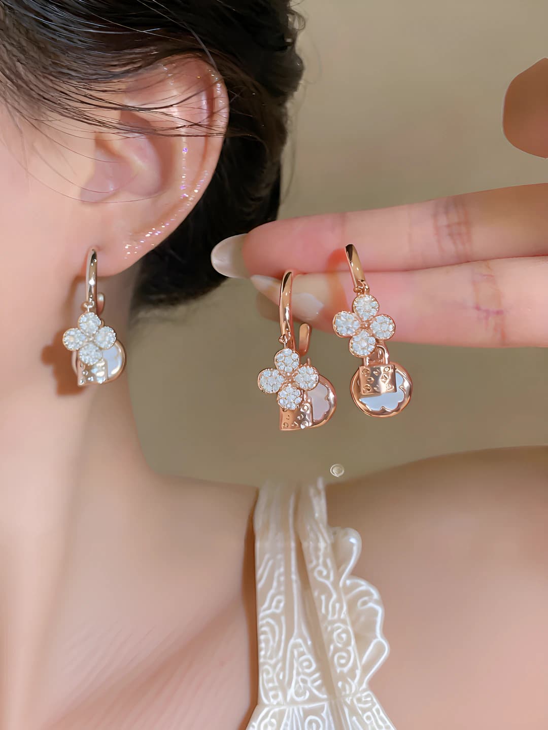 Women's drop earrings with zirconia and shell, flower design element, light luxury style