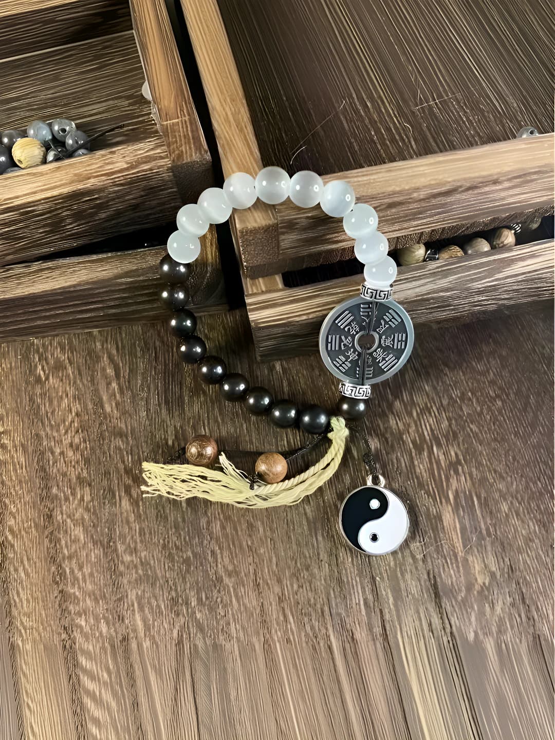 Women's glass and glaze beaded bracelet with peace lock pendant in ethnic style