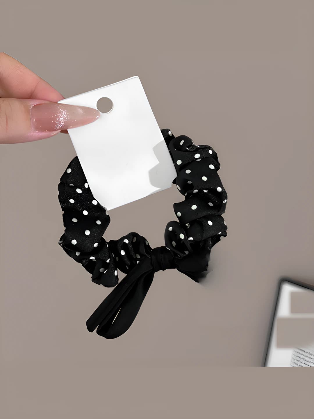 Black polka dot hair tie