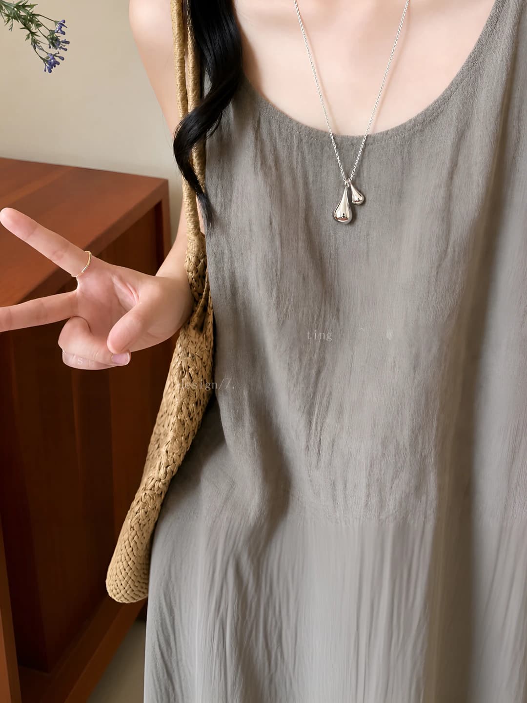 Women's long pendant necklace with silver water drop shape, modern minimalism style, simple accessory