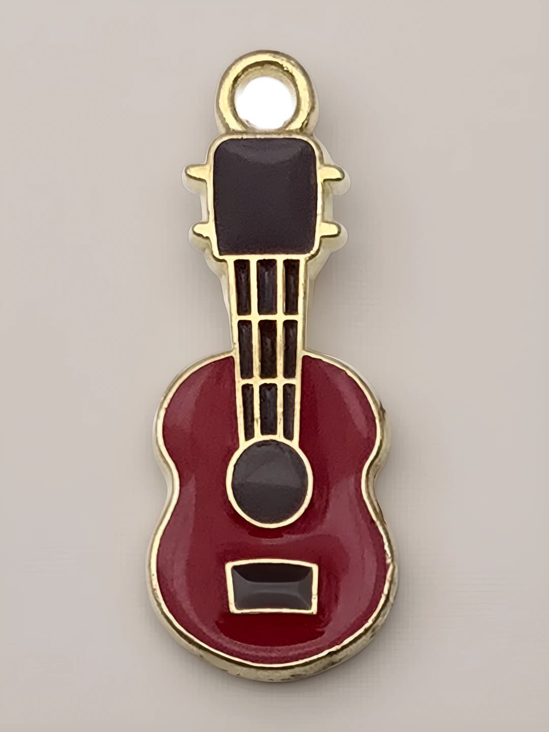 1 dona qizil gitara 23x10mm