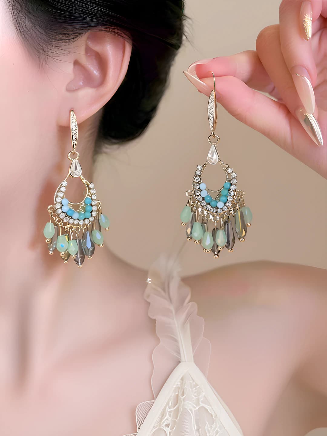 Women's retro style earrings with water drop design element, rhinestone inlay, light luxury and modern design