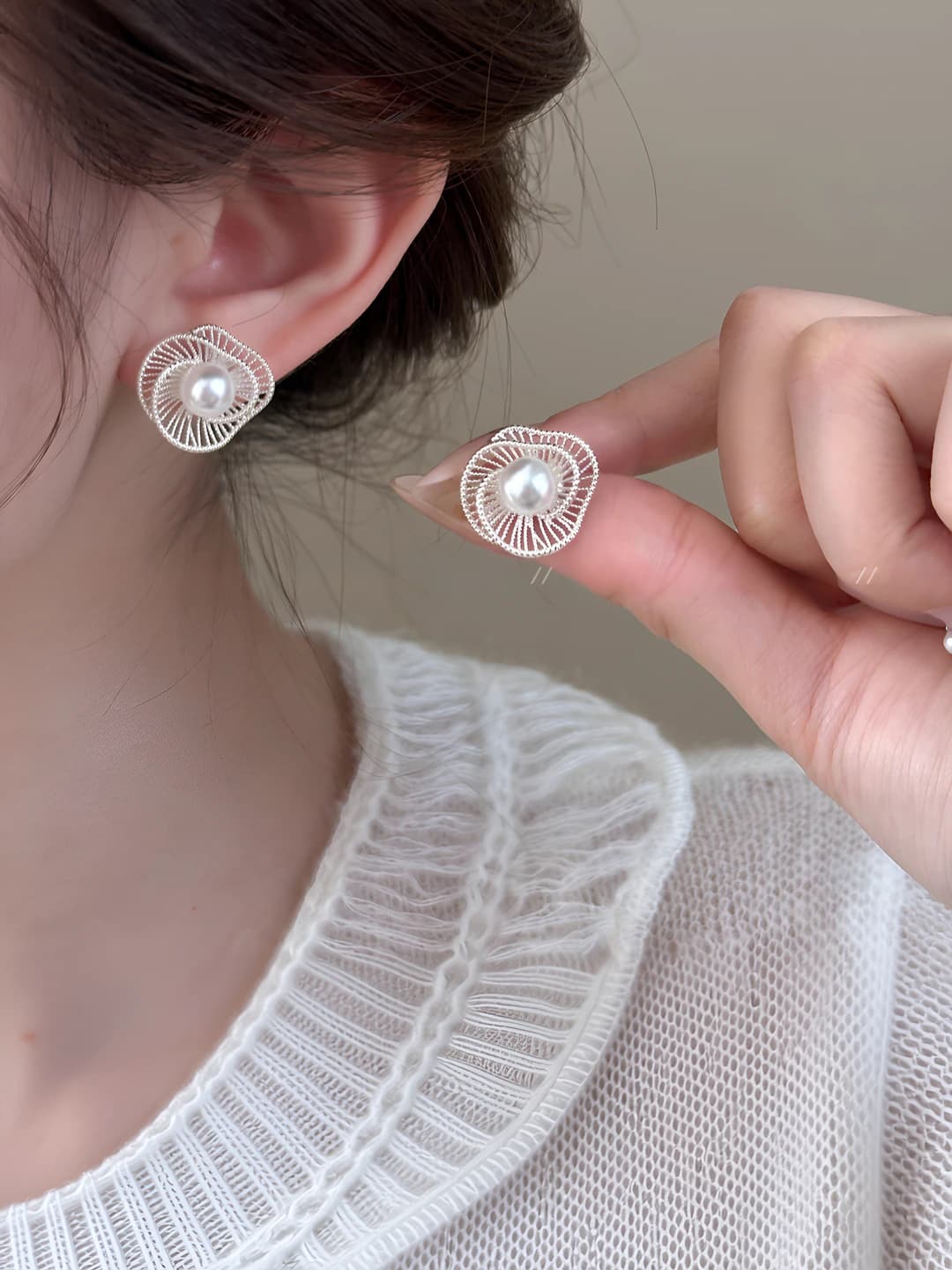 Women's French hollow spiral lotus leaf pearl earrings, 2026, premium feel, simple and elegant
