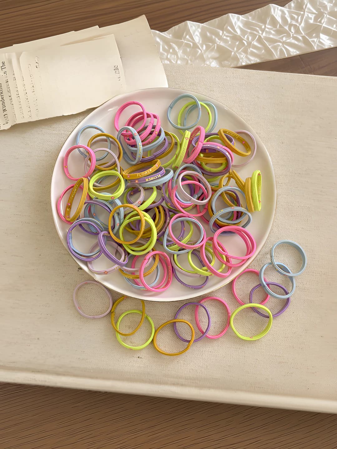 Multicolour flat cord, medium flowers, 100 pcs