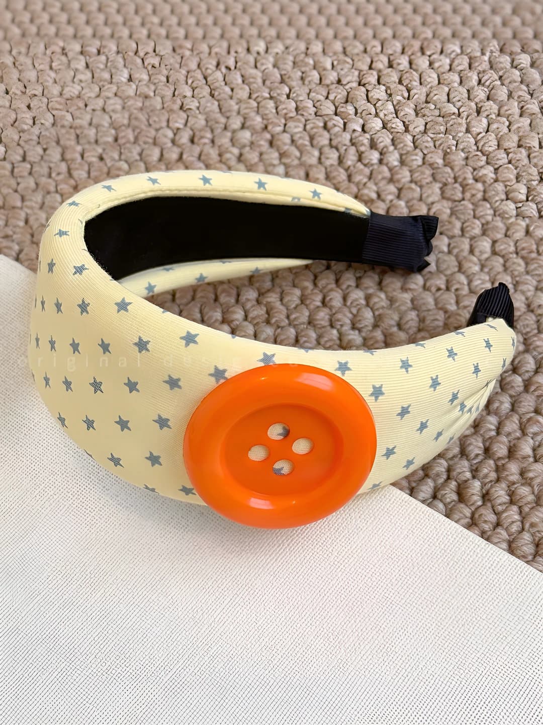 Orange button yellow headband