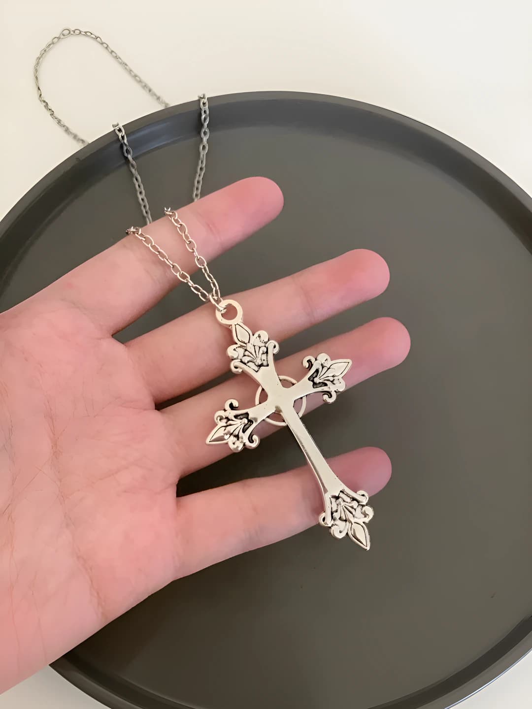 Carved cross chain