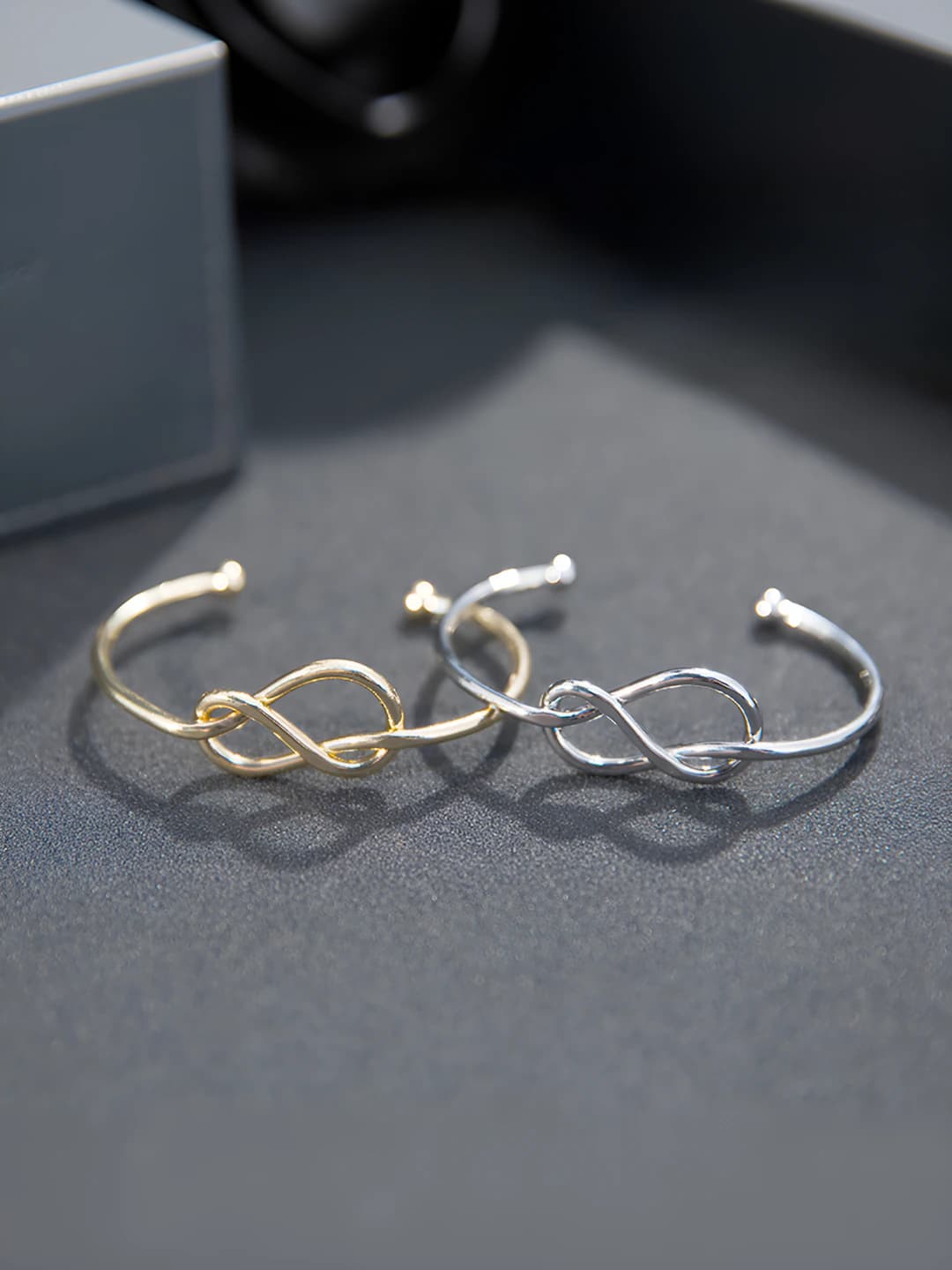 Women's open knot bangle bracelet in figure-8 shape with gold plating