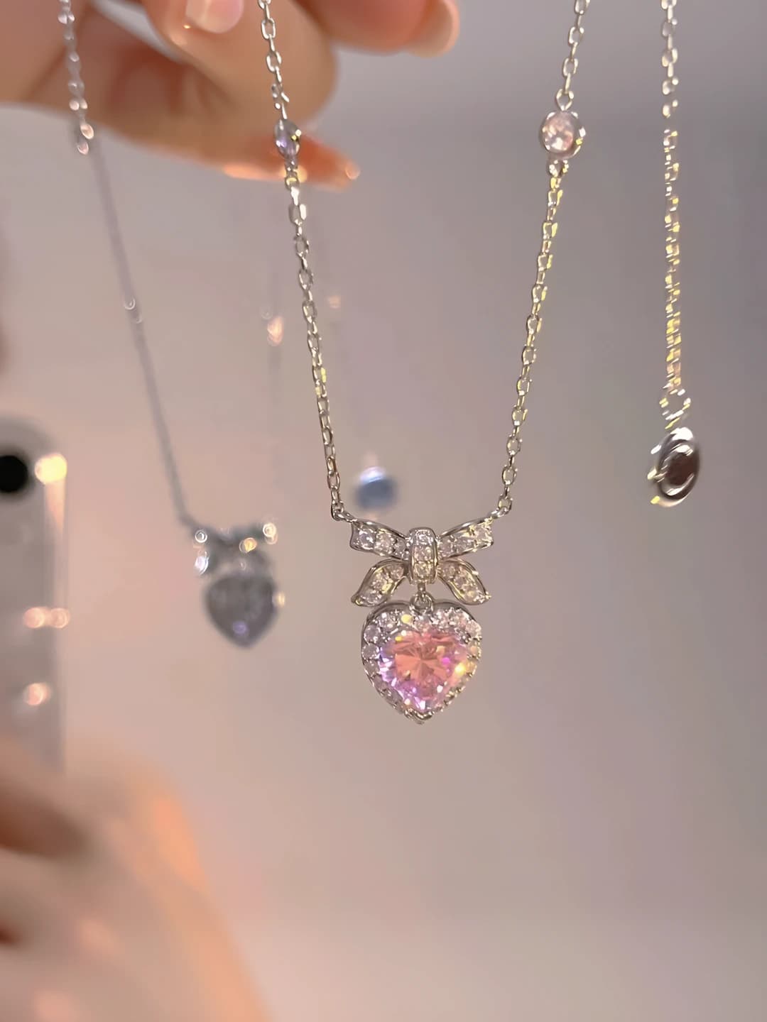Pink diamond heart butterfly necklace