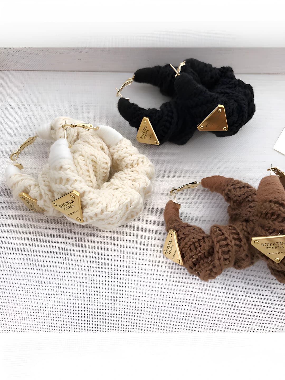 Women's metal earrings with hand-knitted letters and numbers, circular design element, light luxury style