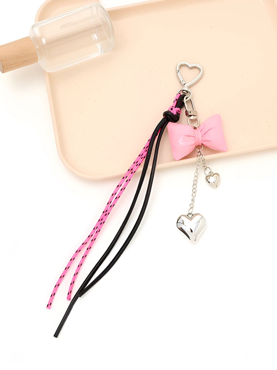 Leather and braided cord, light pink bow
