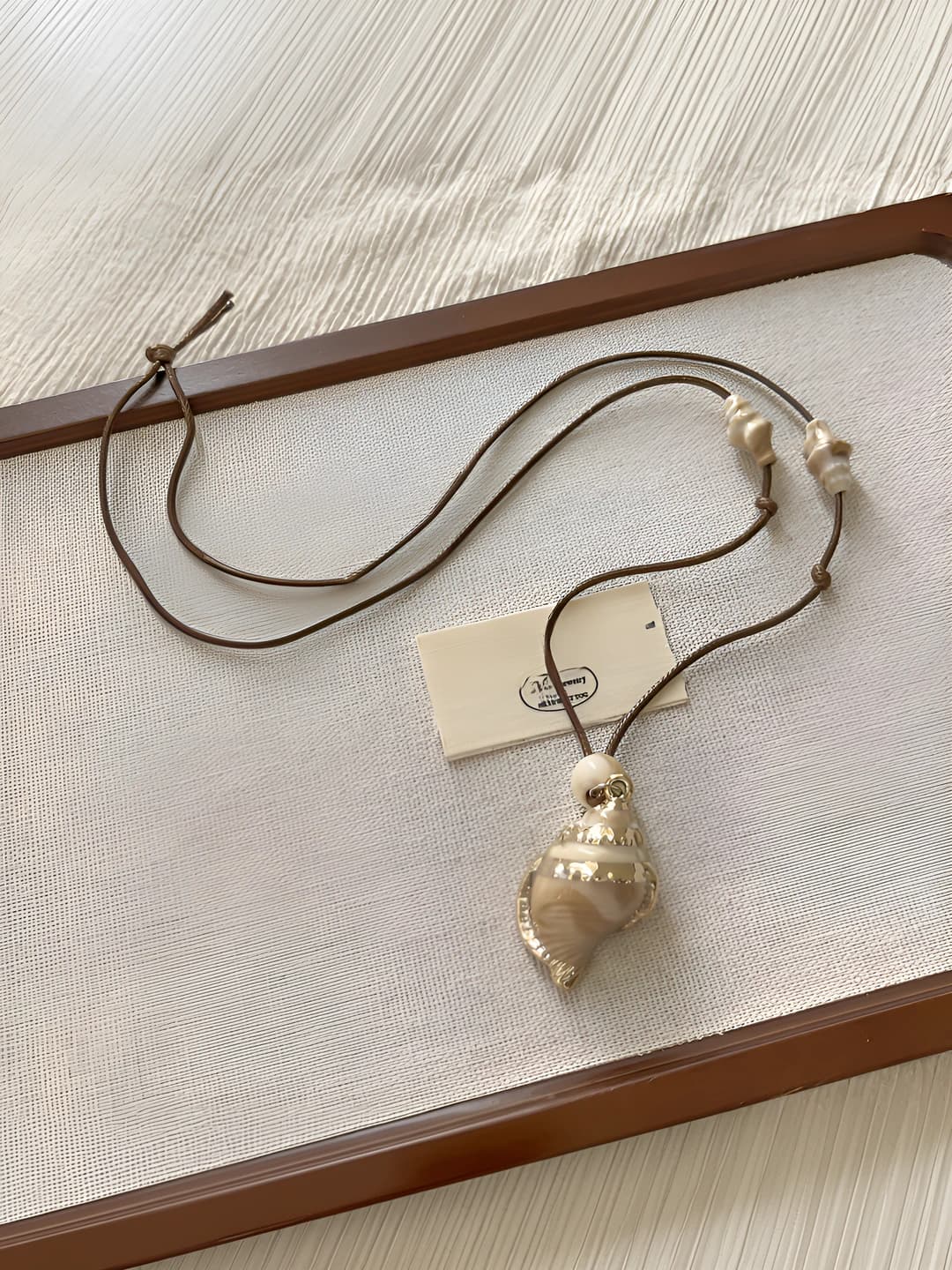 Coffee conch necklace