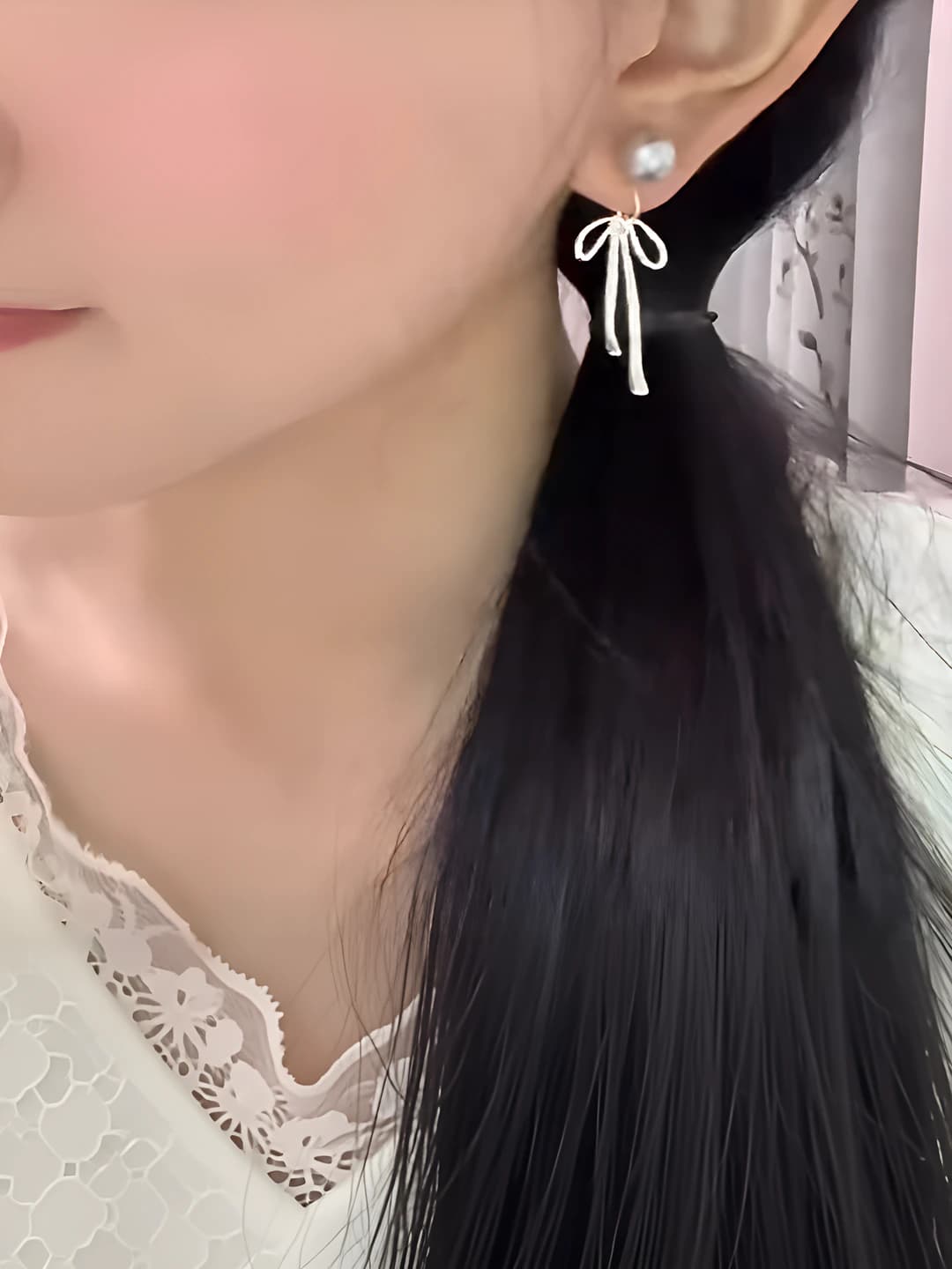 Women's crystal tassel clip-on earrings with bow design