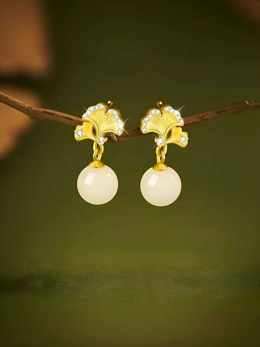 Women's earrings in new Chinese style with ginkgo leaf, geometric design, floral element, electroplating technology