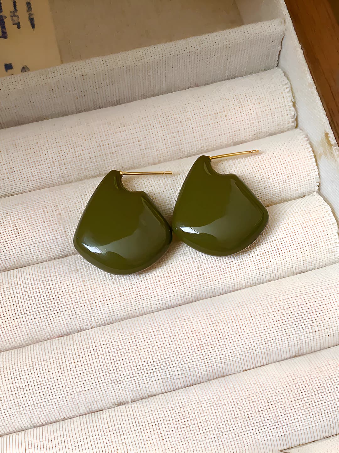Green, gold-plated