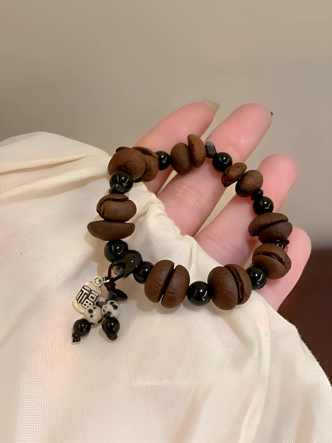 Beaded bracelet with coffee bean design made of natural stone and resin for couples