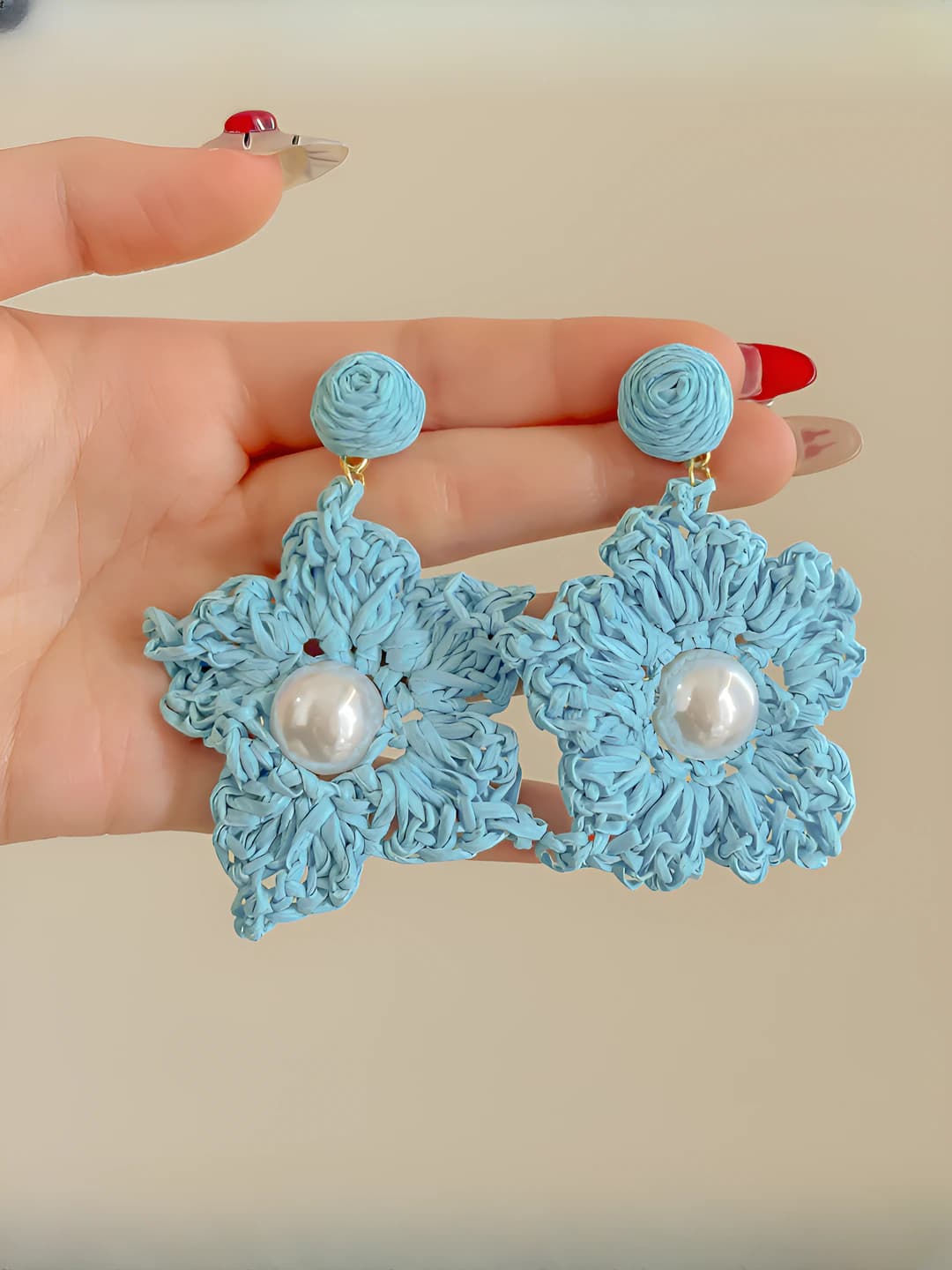 Blue woven pearl star studs - 925 silver