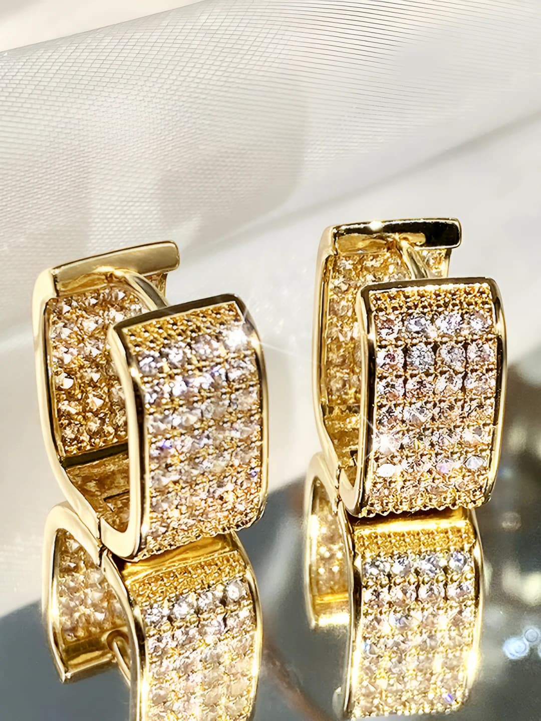 Women's earrings in Euro-American style with micro zirconia, U-shape, with elliptical geometric design element