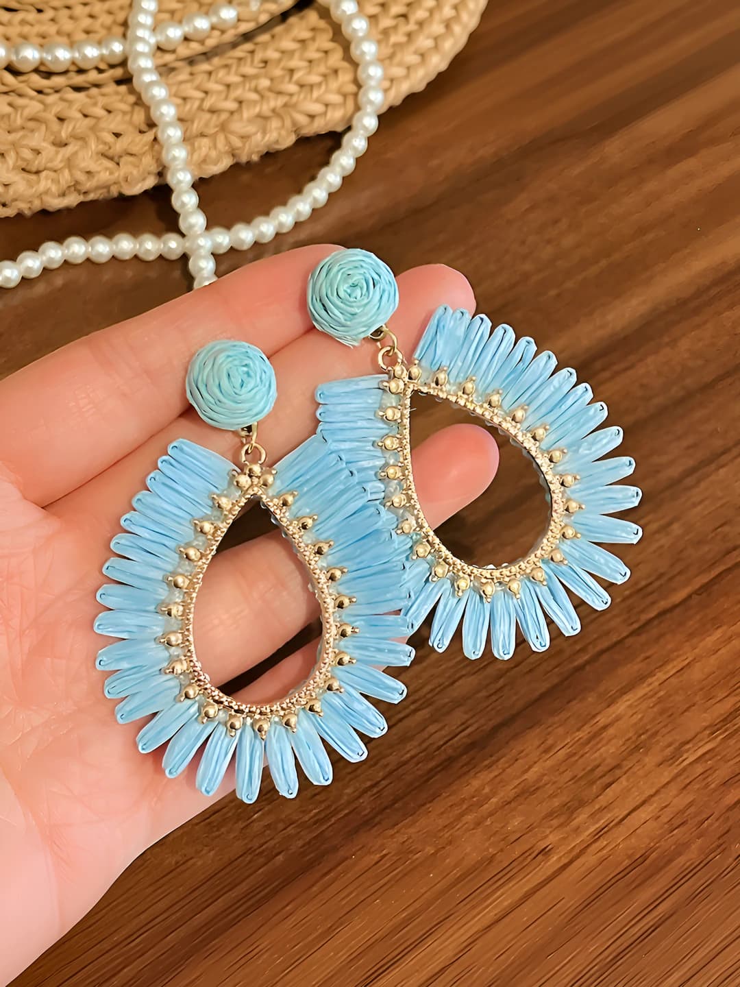 Blue openwork straw studs