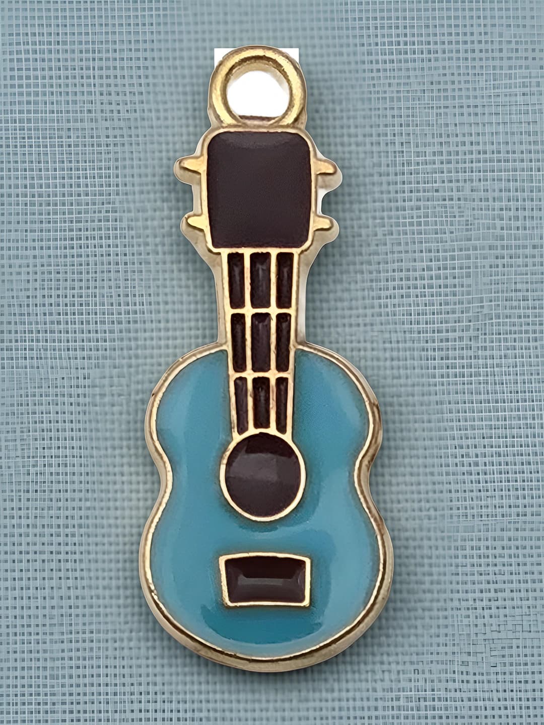 1 dona ko'k gitara 23x10mm