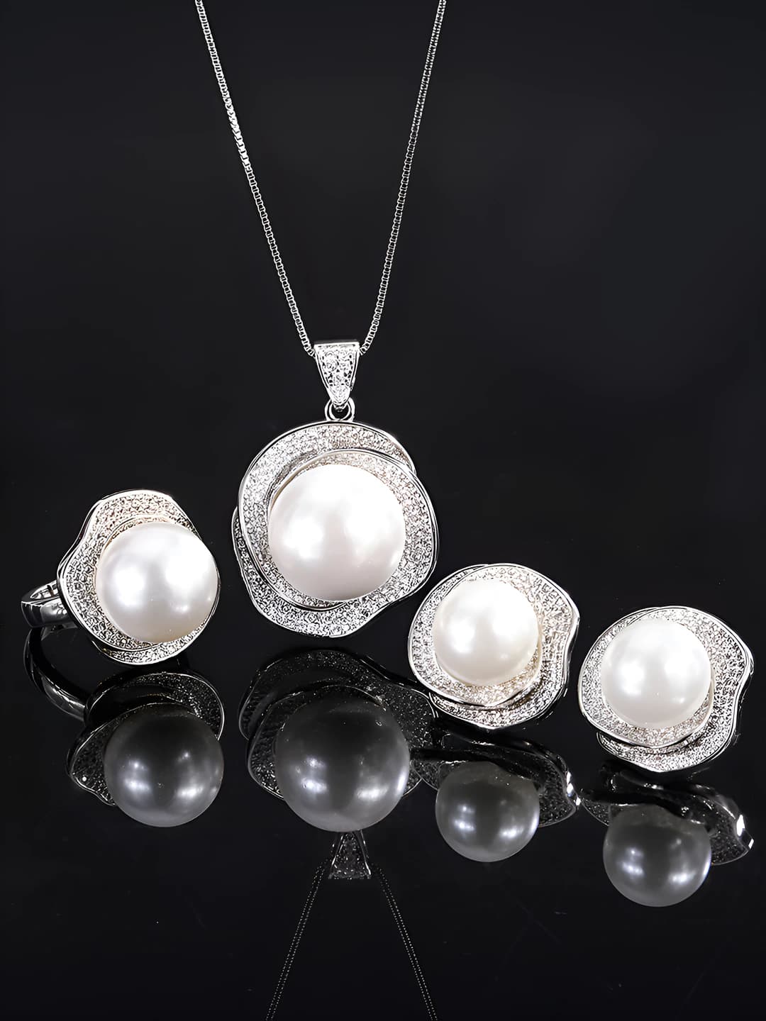 Women's set of ring, pendant and earrings with white shell pearls, geometric shape and diamond inlay