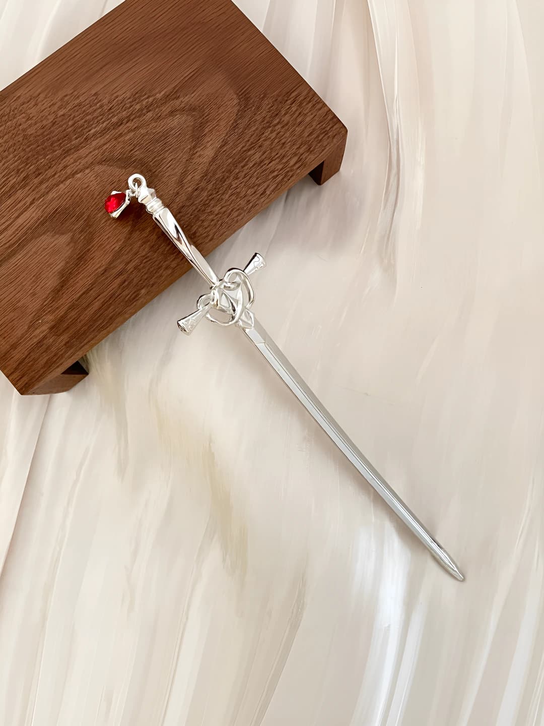 Silver, with charm