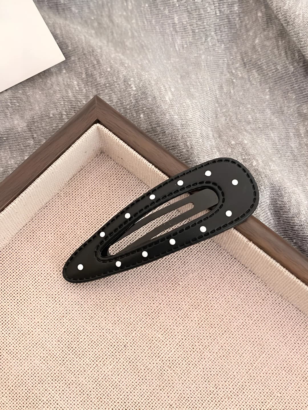 Black - teardrop BB clip with white polka dots