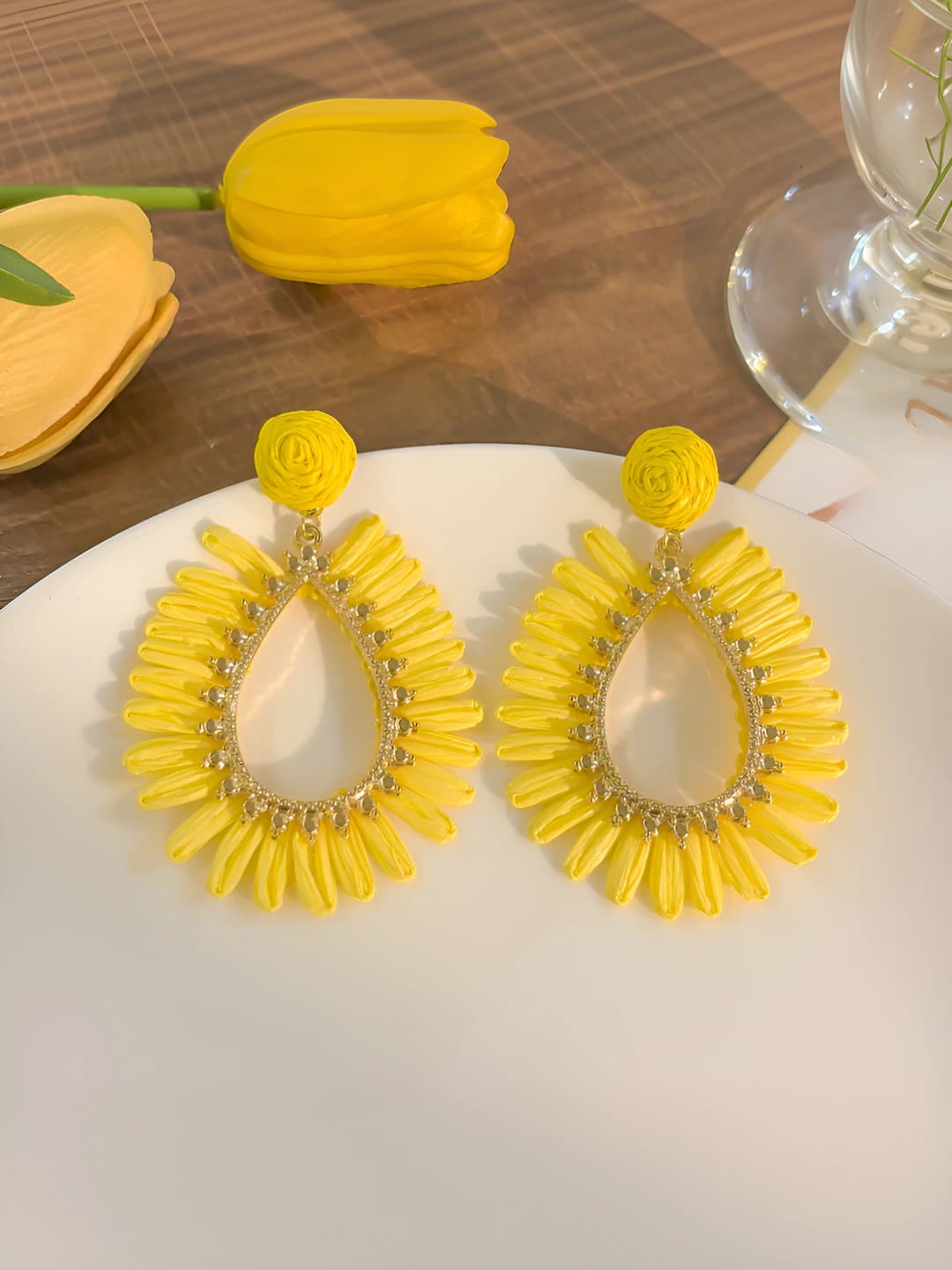 Yellow openwork woven stud earrings