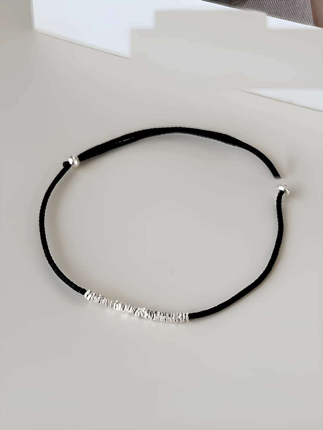 Black hand string