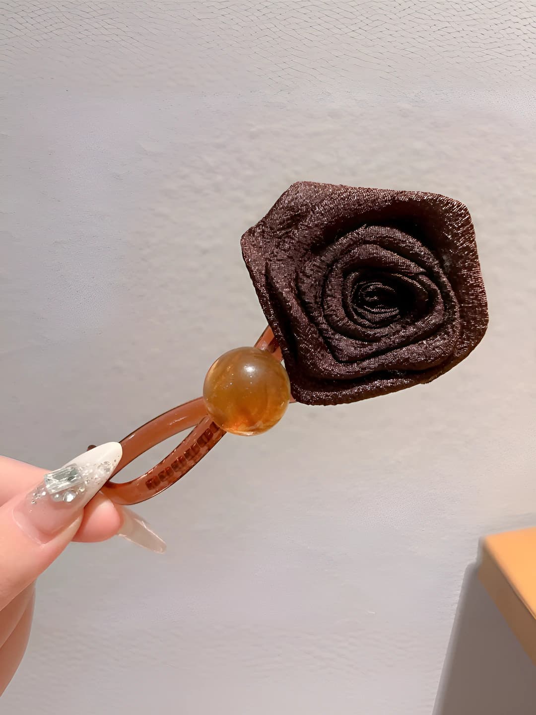 Dark coffee, dried rose