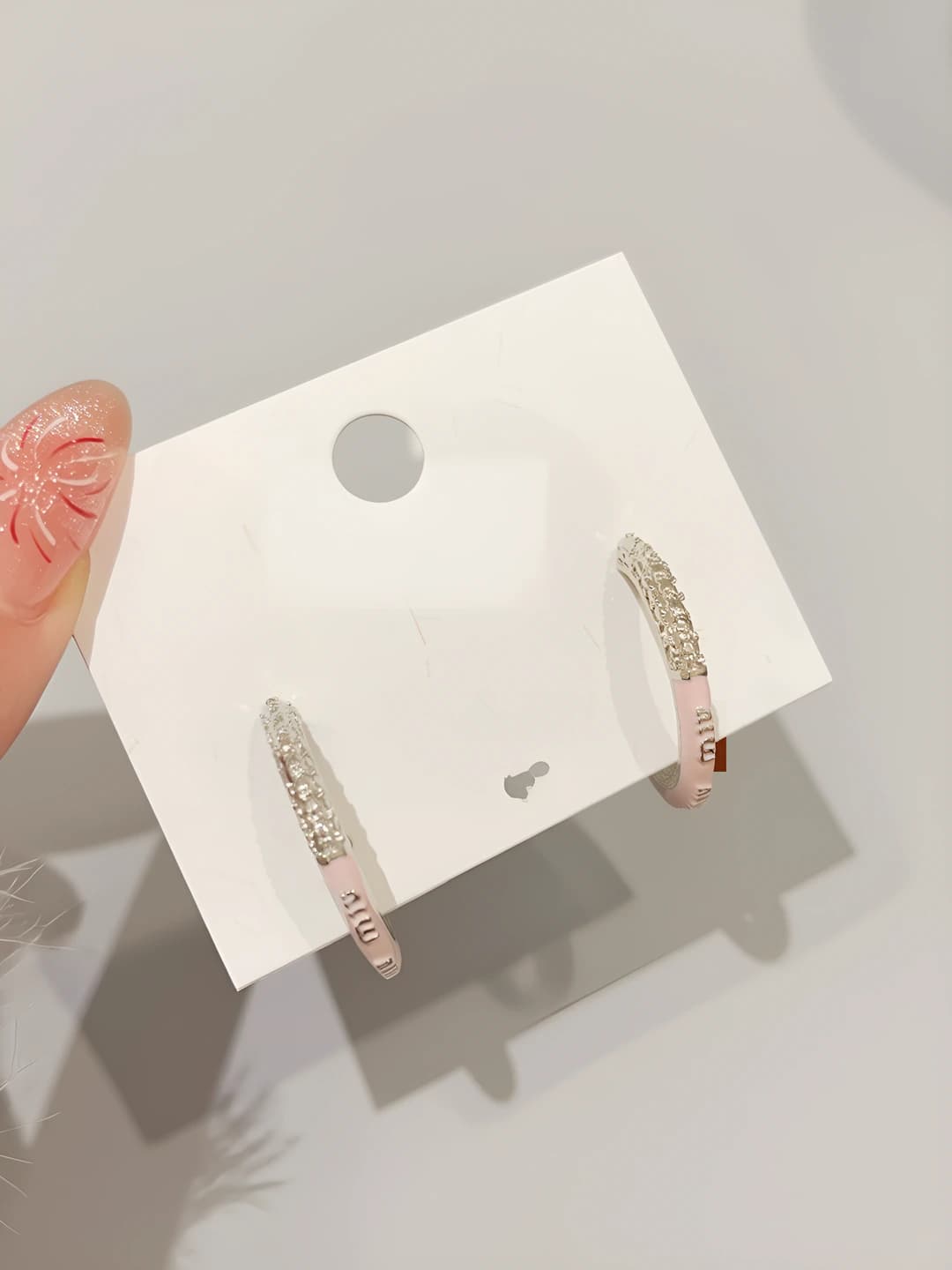 Light pink C-shape hoop earrings