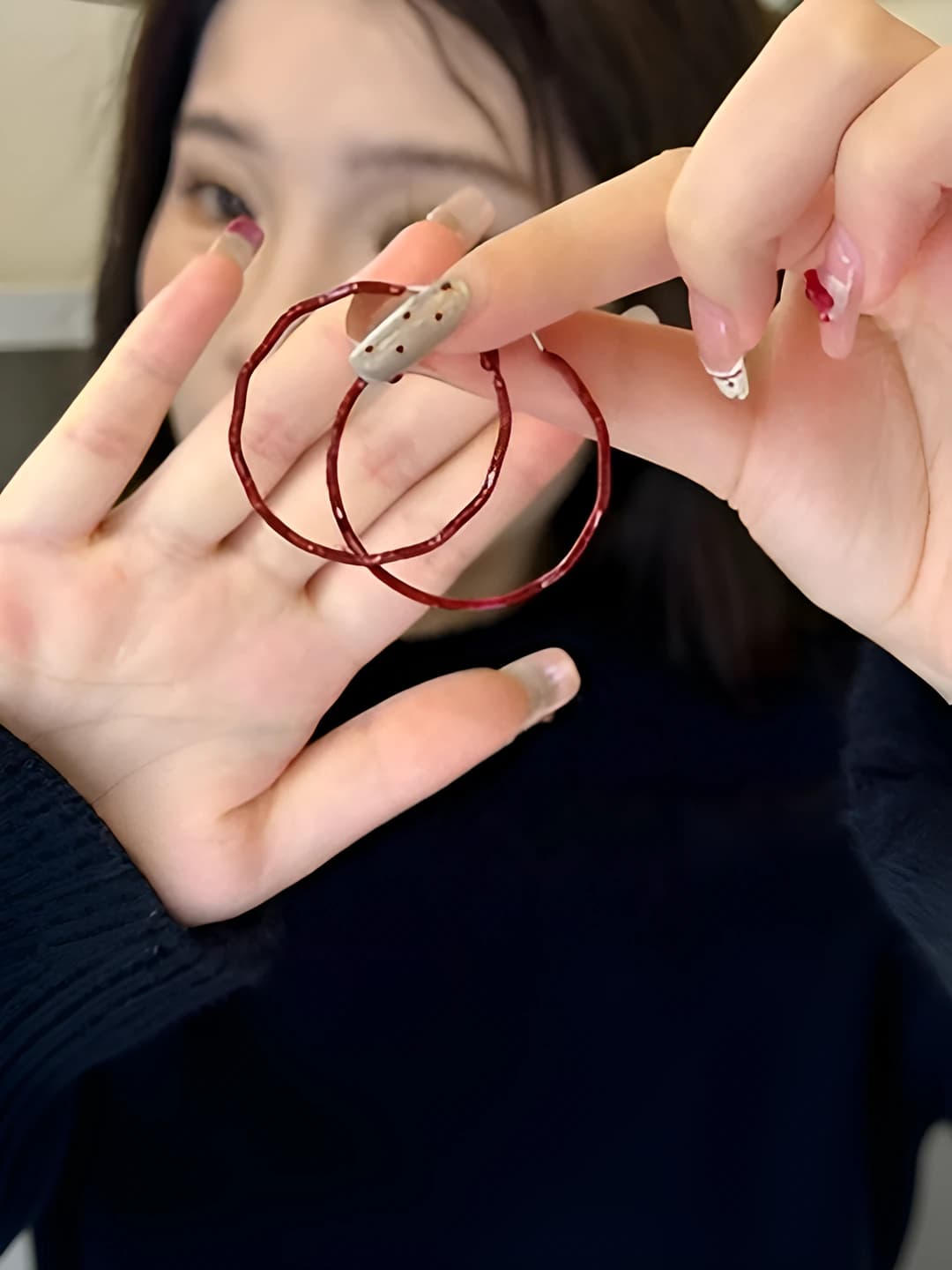 Wavy red ear hoop