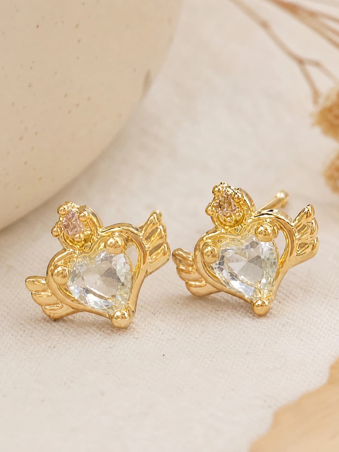 Flying heart stud earrings pair Gold